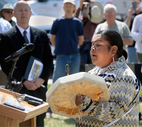 Al Hartmann  |  The Salt Lake Tribune
Markie Rogers sings a traditional Paiute song as Paiute Tribal members, Circleville residents, Utah Division of State History, and LDS Church History representatives gather at the town park Friday April 22 for a dedication ceremony for a new memorial recognizing the men, women and children of the Koosharem Band of the Paiute Indian Tribe killed during the Circleville Massacre in late April 1866.