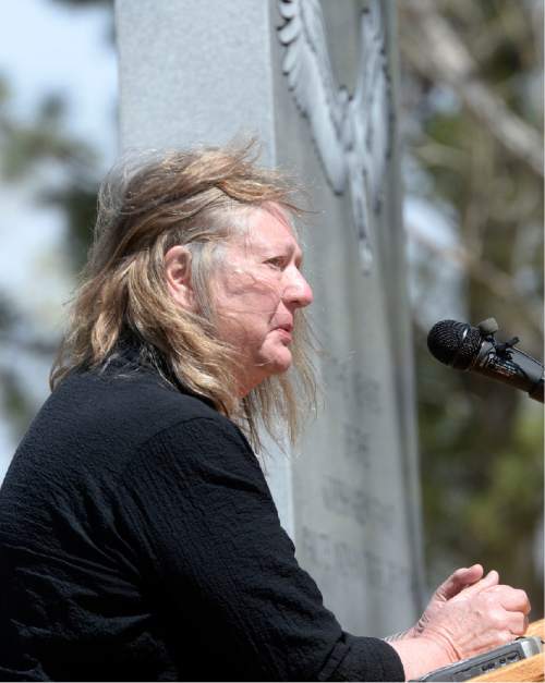 Al Hartmann  |  The Salt Lake Tribune
Author Susan Jensen-Weeks gives emotional remarks to Paiute Tribal members, Circleville residents, Utah Division of State History, and LDS Church History representatives gather at the town park Friday April 22 for a dedication ceremony for a new memorial recognizing the men, women and children of the Koosharem Band of the Paiute Indian Tribe killed during the Circleville Massacre in late April 1866.
