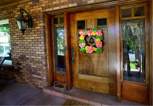 Scott Sommerdorf   |  The Salt Lake Tribune  
The front door of the Prairie-style home of Lana and John Schowengerdt, on Wednesday, April 20, 2016.  The Utah Heritage Foundation 45th Annual Homes Tour takes place  Saturday, April 30, in the tree-lined University neighborhood. Six historic homes, including this one, will be open to the public.
