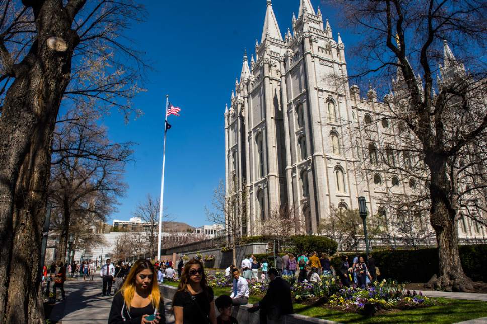 Chris Detrick  |  The Salt Lake Tribune
Mormons walk around Temple Square before the afternoon session of the 186th LDS General Conference at the Conference Center in Salt Lake City Saturday April 2, 2016.
