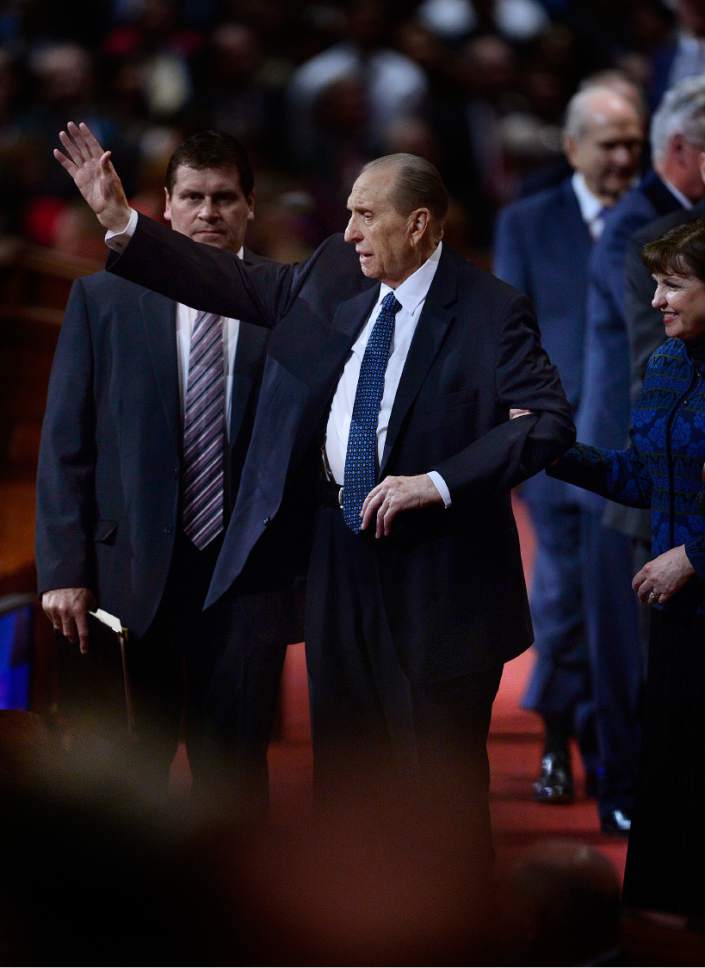 Scott Sommerdorf   |  The Salt Lake Tribune  
President Thomas S. Monson waves goodbye as he leaves the end of the afternoon session of the 186th annual General Conference of the LDS Church, Sunday, April 3, 2016.