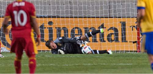 Michael Mangum  |  Special to the Tribune

Real Salt Lake goalkeeper Nick Rimando (18) makes a save during the second half their match against the Colorado Rapids at Rio Tinto Stadium in Sandy, UT on Saturday, April 9, 2016. RSL won 1-0.