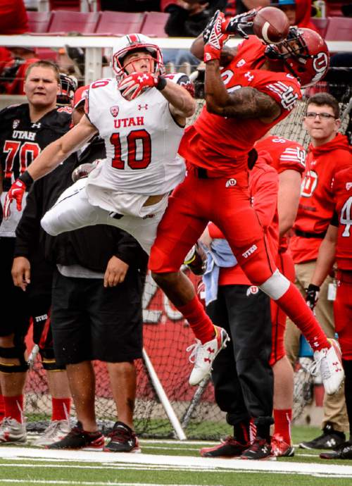 Trent Nelson  |  The Salt Lake Tribune
Mackay Dunn (10) defends the pass to Kenric Young at the University of Utah's Red-White spring football game at Rice-Eccles Stadium in Salt Lake City, Saturday April 23, 2016.