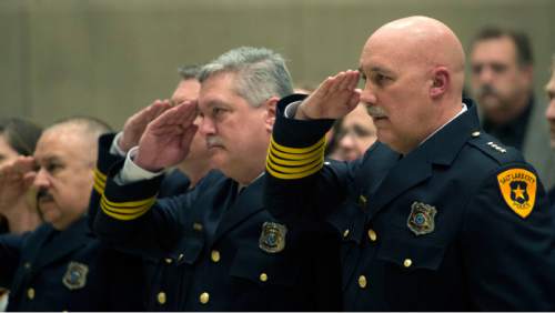 Steve Griffin  |  The Salt Lake Tribune


Salt Lake City interim Police Chief Mike Brown, right, salutes the flag as members of the Salt Lake City Explorers present the colors during Salt Lake City Jackie Biskupski's State of the City address at Mountain View Elementary School in Salt Lake City, Tuesday, January 26, 2016.