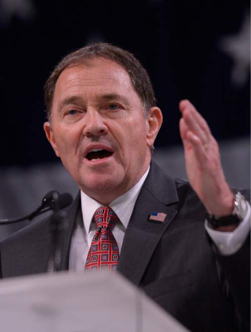 Leah Hogsten  |  Tribune file photo
Gov. Gary Herbert delivers his re-election speech, backed by his family and wife Jeanette Herbert at the Utah Republican Convention, Saturday, April 23, 2016, at Salt Palace Convention Center. Some lobbyists say a campaign meeting recently with donors went too far in suggesting checks would buy quality face time with the governor.