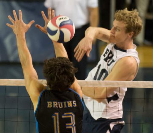 Rick Egan  |  The Salt Lake Tribune

Brigham Young Cougars Jake Langlois (10) hits the ball past
UCLA Bruins Micah Ma'a (13), in BYU's victory in the Mountain Pacific Sports Federation Volleyball Championship game,  in tournament action at the Smith Field House in Provo, Saturday, April 23, 2016.