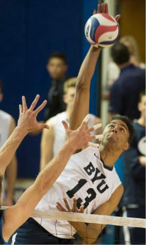Rick Egan  |  The Salt Lake Tribune

Brigham Young Cougars Ben Patch (13) hits the ball past UCLA Bruins Mitch Stahl (7) in the Mountain Pacific Sports Federation Volleyball Championship game, as BYU beat UCLA 3- 1, in tournament action at the Smith Field House in Provo, Saturday, April 23, 2016.