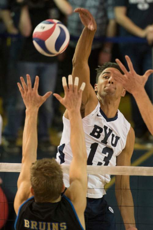 Rick Egan  |  The Salt Lake Tribune

Brigham Young Cougars Ben Patch (13) hits the ball past UCLA Bruins Jake Arnitz (15), in the Mountain Pacific Sports Federation Volleyball Championship game, as BYU beat UCLA 3- 1, in tournament action at the Smith Field House in Provo, Saturday, April 23, 2016.