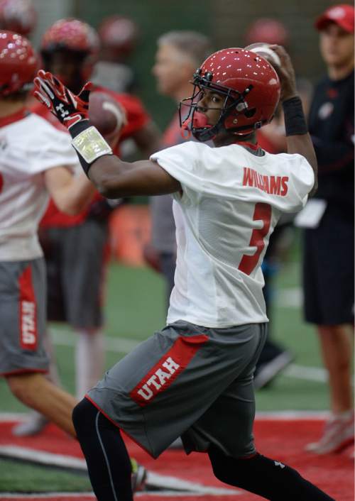 Francisco Kjolseth | The Salt Lake Tribune
Quarter back Troy Williams finds his target as the University of Utah football team kicks off opening day of spring practice on Tuesday, March 22, 2016.