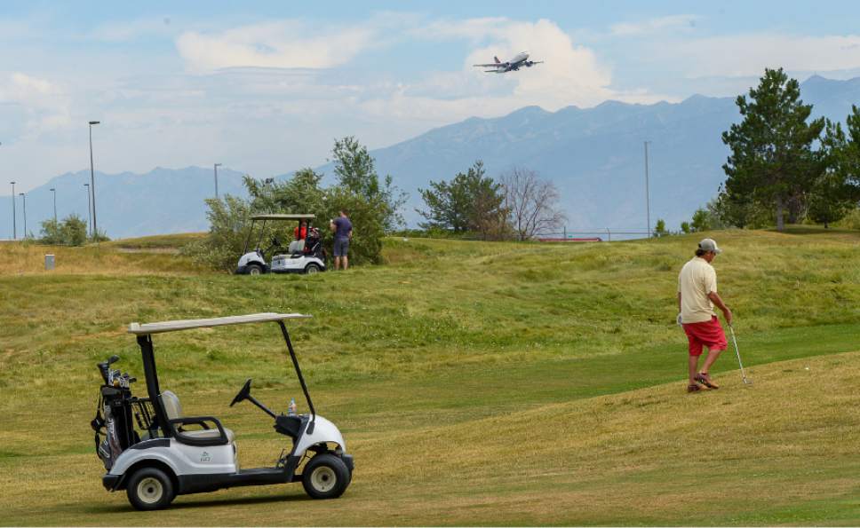 Francisco Kjolseth  |  Tribune file photo
Planes take off from Salt Lake City International Airport in May alongside Wingpointe Golf Course, which closed at the end of the 2016 golf season. The Salt Lake Department of Airports has determined not to operate or lease the 18-hole course that was built in 1987.