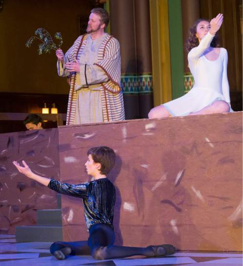 Rick Egan  |  The Salt Lake Tribune

Tyler Oliphant as Noye, holds the olive branch, as Jonas Malinka -Thompson, the Raven, and Sophia Hickey, the Dove pose neary by, in the Cathedral of the Madeleine performance of Benjamin Britten's short opera "Noye's Fludde" as part of the Madeleine Festival, at the Cathedral of the Madeleine, Friday, April 29, 2016.