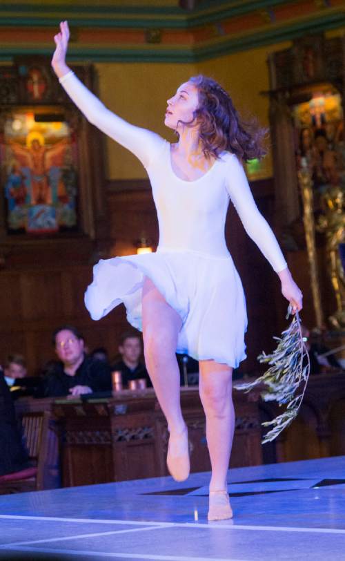 Rick Egan  |  The Salt Lake Tribune

Sophia Hickey performs as The Dove in the Cathedral of the Madeleine performance of Benjamin Britten's short opera "Noye's Fludde" as part of the Madeleine Festival, at the Cathedral of the Madeleine, Friday, April 29, 2016.
