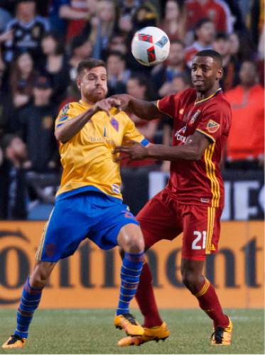 Michael Mangum  |  Special to the Tribune

Colorado Rapids forward Luis Solignac (21) and Real Salt Lake defender Aaron Maund (21) battle for a 50-50 ball during the first half their match at Rio Tinto Stadium in Sandy, UT on Saturday, April 9, 2016.