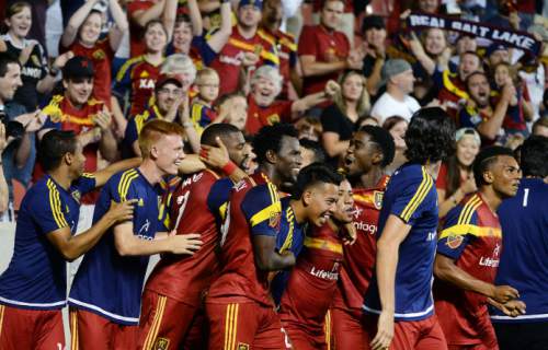 Steve Griffin  |  The Salt Lake Tribune


RSL defender Aaron Maund is swarmed by his teammates after heading in the game winner as Real Salt Lake defeats the L.A. Galaxy during their U.S. Open Cup match at Rio Tinto Stadium in Sandy, Tuesday, July 14, 2015.