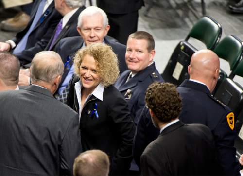 Lennie Mahler  |  Tribune file photo
Salt Lake City Mayor Jackie Biskupski speaks with officers prior the funeral for Unified Police Department officer Doug Barney at the Maverik Center in West Valley City in January.