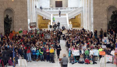 Al Hartmann  |  The Salt Lake Tribune
Over 300 local students from the Madeleine Choir School and Salt Lake School for the Performing Arts marched up State Street to meet in the Capitol rotunda for a clean air Thursday Feb. 4.  Salt Lake City Mayor Jackie Biskupski speaks to the group.