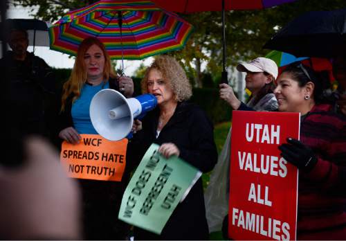 Scott Sommerdorf   |  The Salt Lake Tribune
Jackie  Biskupski speaks at a protest outside the Grand America Hotel and prior to a march by LGBT activist and allies, including Salt Lake County District Attorney Sim Gill, and Mark Lawrence, Thursday, October 29, 2015.