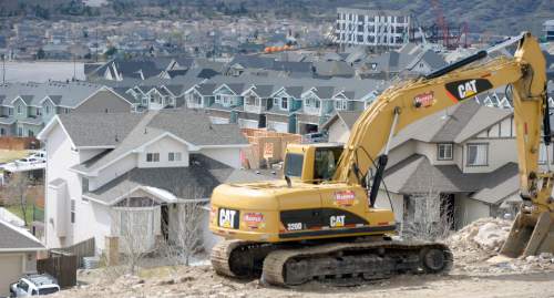 Al Hartmann  |  The Salt Lake Tribune 
New houses have sprung up just north of I-15 in Lehi near the Outlets at Traverse Mountain.  Utah County is growing at a rapid rate, especially Lehi.