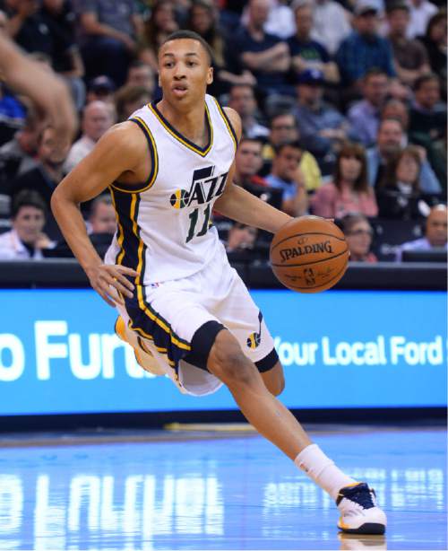 Steve Griffin  |  The Salt Lake Tribune

Utah Jazz guard Dante Exum (11) drives into the lane during first half action in the Utah Jazz versus Washington Wizards NBA basketball game at EnergySolutions Arena in Salt Lake City, Wednesday, March 18, 2015.
