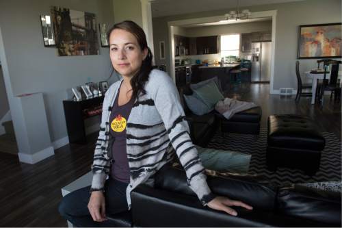 Leah Hogsten  |  The Salt Lake Tribune
Jennifer Searle claims she has had a persistent problem with leaky windows in her townhouse, one of several town homes in the Sunflower Crossing subdivision, built by Destination Homes. Searle and her attorney have tried to negotiate repairs with Destination Homes  CEO Brad Wilson. Tuesday, April 19, 2016.