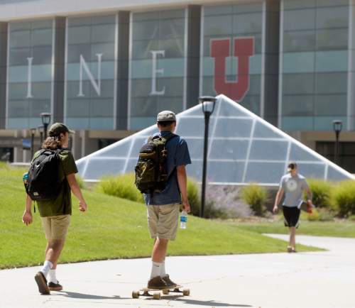 Al Hartmann  |  The Salt Lake Tribune
Students at the University of Utah walk from classes near the Marriott Library building for the first day of Fall 2015 classes.