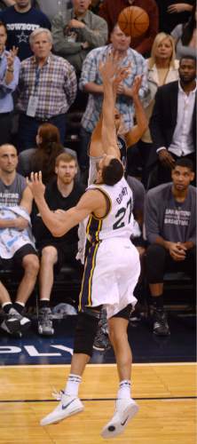 Steve Griffin  |  The Salt Lake Tribune


San Antonio Spurs guard Tony Parker (9) nails a late three pointer over Utah Jazz center Rudy Gobert (27) during the Jazz versus Spurs NBA basketball game at Vivint Smart Home Arena in Salt Lake City, Tuesday, April 5, 2016.