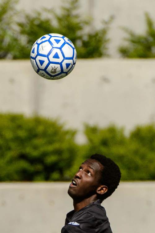 Trent Nelson  |  The Salt Lake Tribune
Layton Christian's Henry Nkusi (15) looks to the ball vs. American Prep in the first round of the boys' soccer Class 2A postseason, Wednesday May 4, 2016.