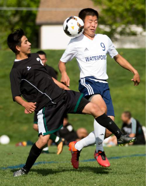 Rick Egan  |  The Salt Lake Tribune

Joe Rivera (2) Wendover kicks the ball, as   Lewis Lin (9) Waterford, defends, in prep soccer action in Sandy, Wednesday, May 4, 2016.