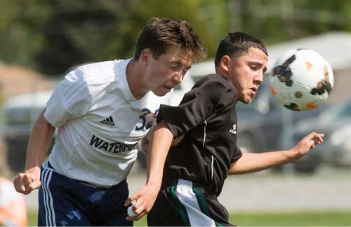 Rick Egan  |  The Salt Lake Tribune

Benjamin Battestone (32) Waterford, gets his head on the ball, as he collides with Adolphi Perez (12) Wendover,in prep soccer action in Sandy, Wednesday, May 4, 2016.