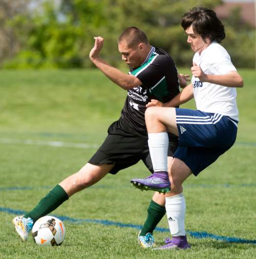 Rick Egan  |  The Salt Lake Tribune

Juan Ibarra (15) Wendover, goes for the ball, along with Austin Whitely (3) Waterford, in prep soccer action in Sandy, Wednesday, May 4, 2016.