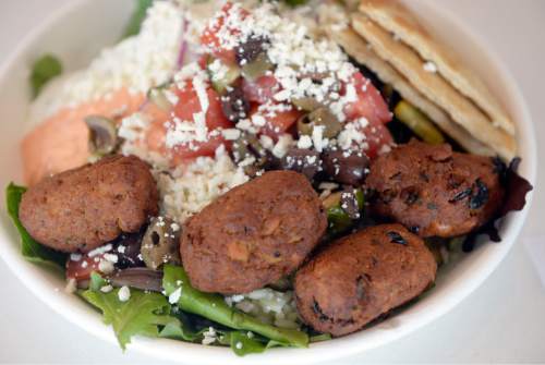 Al Hartmann  |  The Salt Lake Tribune
House falafel with Greek salad, pita and feta cheese at GR Kitchen, a fast-casual restaurant at 7702 Union Park Ave. in Midvale.