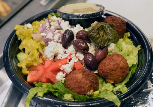 Al Hartmann  |  The Salt Lake Tribune
Chopped Greek salad with falafel bombs at Padeli's Street Greek, a fast-casual restaurant in Salt Lake City that makes gyros and more to order.