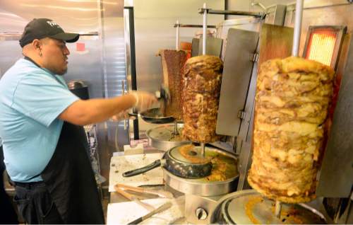 Al Hartmann  |  The Salt Lake Tribune
Slow roasting lamb-beef, pork and chicken  at Padeli's Street Greek, a fast-casual restaurant that makes gyros and more to order at 30 E. 300 S. in Salt Lake City.