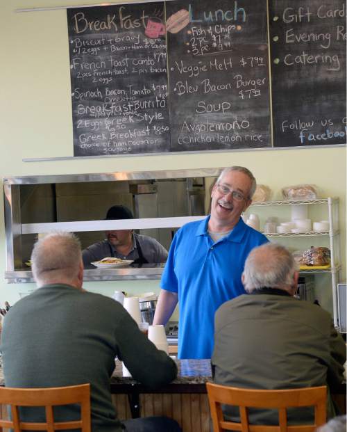 Al Hartmann  |  The Salt Lake Tribune
 Michael Jessee chats with two of the regulars at the counter at the new Landmark Grill at 760 Fort Union Blvd in Midvale.  Salt Lake City's legendary Roundhouse breakfast, served at the old Medical Towers restaurant (by owner Nick Ligeros), has returned. Ligeros' daughter, MariAnn Jessee and her husband Michael, recently bought the Landmark Grill and added the Roundhouse to the menu. Jessee said she has been looking to buy a restaurant for about six years so she could resurrect her fathers original recipes and continuing his legacy.