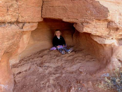 Erin Alberty  |  The Salt Lake Tribune

A young hiker finds a hiding spot just below the plateau on Lower Aztec Butte in Canyonlands National Park.
