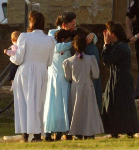 Trent Nelson  |  The Salt Lake Tribune

A group of FLDS women tearfully embrace after being reunited at Fort Concho, where they are temporarily being housed. FLDS women and children from the YFZ Ranch were escorted in several buses by Texas Child Protective Services workers and Texas State Troopers to Fort Concho in San Angelo, Texas Sunday, April 6, 2008.