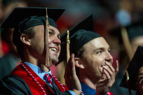 Chris Detrick  |  The Salt Lake Tribune
University of Utah graduates celebrate during the annual Commencement at the Huntsman Center Thursday May 5, 2016.