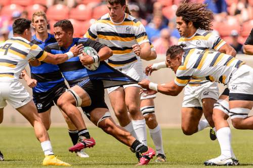 Trent Nelson  |  The Salt Lake Tribune
BYU's Ara Elkington (7) gets tangled up as BYU faces Cal in the Penn Mutual Varsity Cup National Rugby Championship at Rio Tinto Stadium in Sandy, Saturday May 2, 2015.