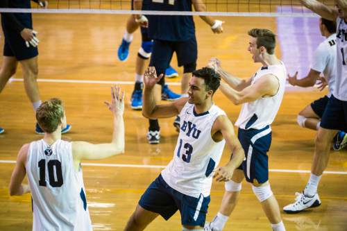 Chris Detrick  |  The Salt Lake Tribune
BYU's Jake Langlois (10) and Ben Patch (13) celebrate a point during the MPSF tournament semifinal at Smith Fieldhouse Thursday April 21, 2016.