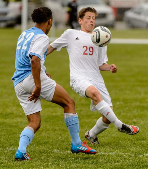 Trent Nelson  |  The Salt Lake Tribune
Ben Lomond's Deontay Nish and Grantsville's Micheal Shepard in the first round of the boys' high school soccer Class 3A postseason, Thursday May 5, 2016.