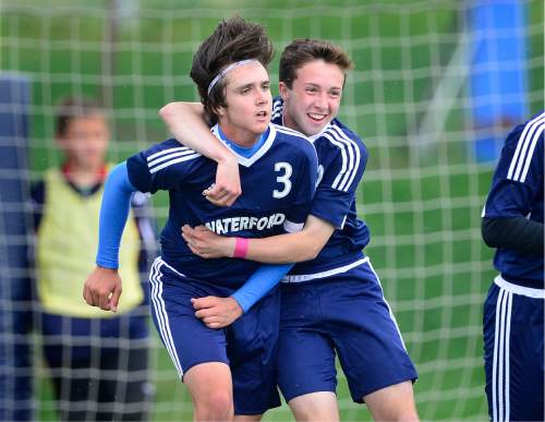 Scott Sommerdorf   |  The Salt Lake Tribune  
Waterford's Austin Whiteley, left is congratulated after he scored Waterford's second goal of the game during first half play. Waterford beat American Leadership Academy, 6-0 in the quarterfinals of the Class 2A boys' soccer tournament, Saturday, May 7, 2016. The game was a rematch of last year's state championship game won by ALA.