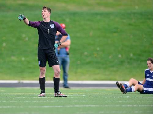 Scott Sommerdorf   |  The Salt Lake Tribune  
American Leadership goalkeeper Taylor Negus responds to a fan that was heckling him during first half play. Waterford beat American Leadership Academy, 6-0 in the quarterfinals of the Class 2A boys' soccer tournament, Saturday, May 7, 2016. The game was a rematch of last year's state championship game won by ALA.