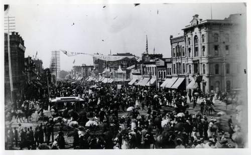 Tribune file photo
Salt Lake City's Main Street, with Auerbach's department store in the center of the picture, bustles with activity in the mid-1880s.