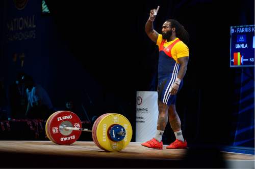 Scott Sommerdorf   |  The Salt Lake Tribune  
Kendrick Farris celebrate a successful snatch lift in the Men's 105+ Snatch competition at the 2016 Olympic trials, Sunday, May 7, 2016. Farris was one of eight top finishers on the men's side of the competition.