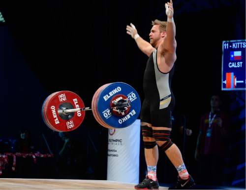Scott Sommerdorf   |  The Salt Lake Tribune  
Wes Kitts celebrates a successful snatch lift in the Men's 105+ Snatch competition at the 2016 Olympic trials, Sunday, May 7, 2016. Kitts was one of eight top finishers on the men's side of the competition.