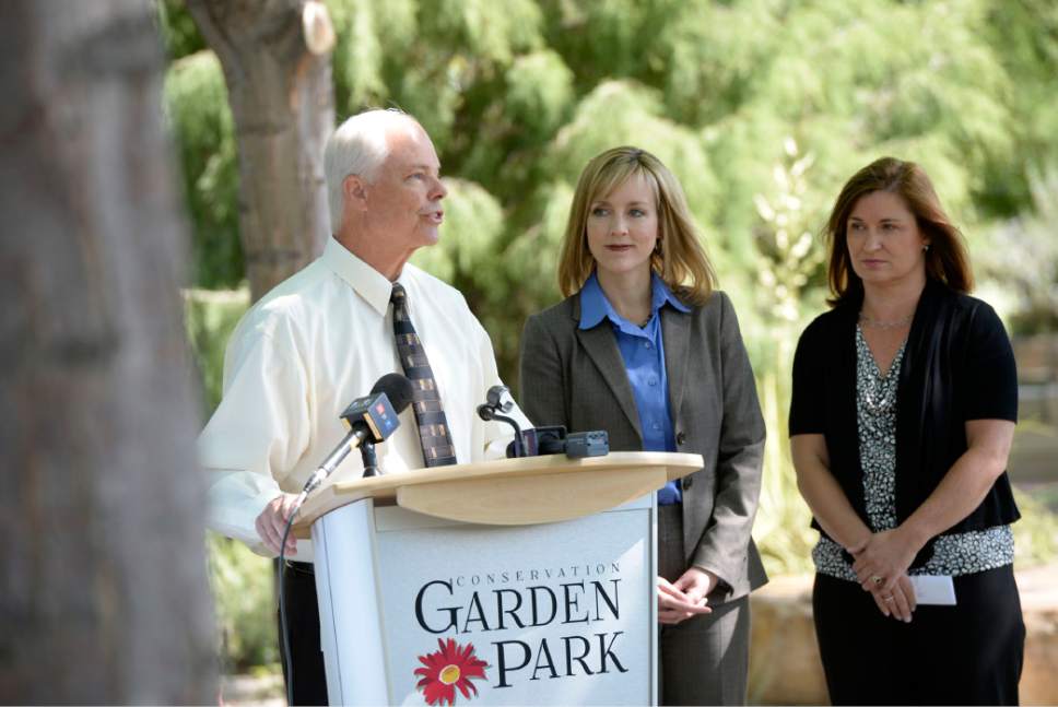 Al Hartmann |  Tribune file photo
Jordan Valley Water Conservancy District CEO and General Manager Richard Bay, left,  with Salt Lake County Council members Aimee Winder Newton and Jenny Wilson to urge moderation in using precious water resources. Bat said the district has gone to annual rate increases to keep up with rising costs and population rather than hold off for years at a time and impose sudden sharp increases.
