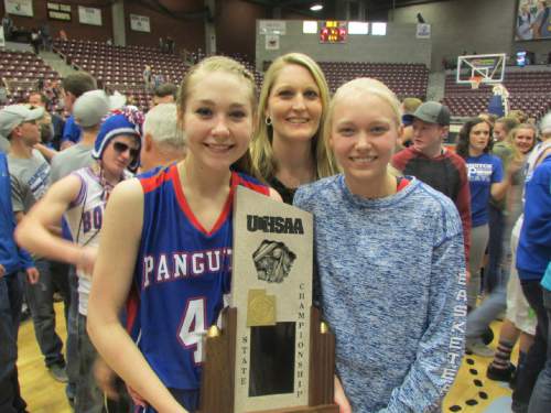Tom Wharton  |  The Salt Lake Tribune

Panguitch assistant coach Tammi Bennett celebrates Bobcats third straight 1A girls title with daughters Taylor, left, and Jordan.
