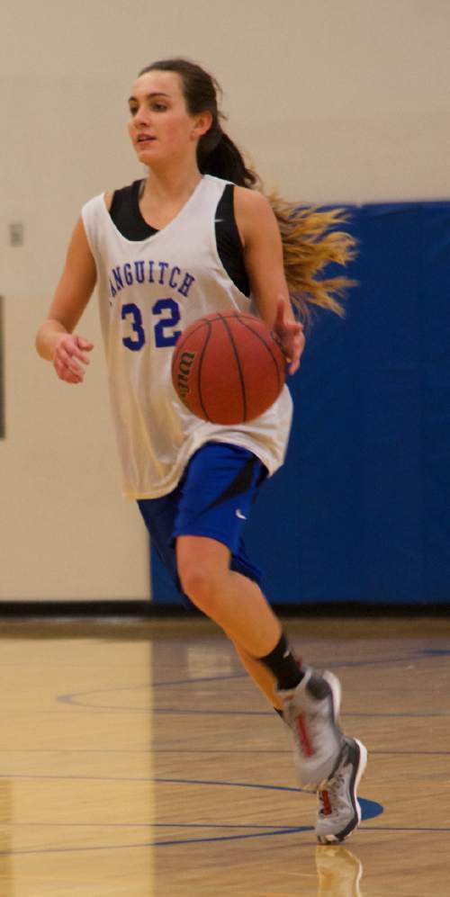 Lynn R. Johnson  | Special to the Tribune

Panguitch High School senior Whittni Orton is a top-ranked female athlete in Utah.  Orson, seen here during practice in the town's elementary school gymnasium, will be attending Brigham Young University in 2016, joining that school's cross country track team.