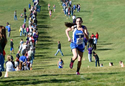 Scott Sommerdorf  |  The Salt Lake Tribune
Whittni Orton of Panguitch on her way to winning the Utah state girls 1A cross country race held at Sugarhouse Park, Wednesday, October 22, 2014.