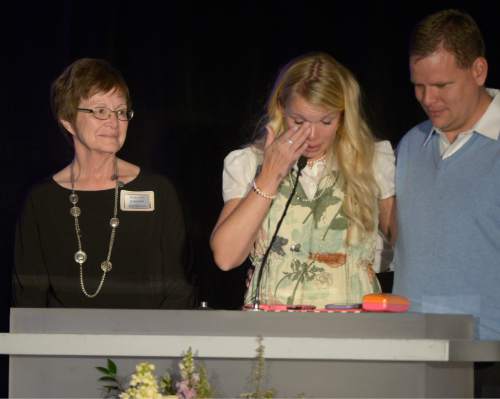 Leah Hogsten  |  The Salt Lake Tribune
Emcee Jennifer Huntsman Parkin (center) wipes away tears as she talks about the importance of special needs teachers, prior to awarding Dorothy Johnson (left) the Mark Huntsman Award, in honor of Jennifer's brother Mark Huntsman, (right).  Dorothy Johnson, one of 11 winners of the 2016 Huntsman Award for Excellence in Education, is honored Friday evening at the Little America Hotel by philanthropists Jon and Karen Huntsman. Johnson has been an exemplary special education teacher at Manti Elementary for 15 years.  Johnson teaches and manages students with mild/moderate learning disabilities in this Title 1 School in rural Utah and the needs of her students have driven her professional 
development focus.


Photo taken Wednesday, May 11, 2016.